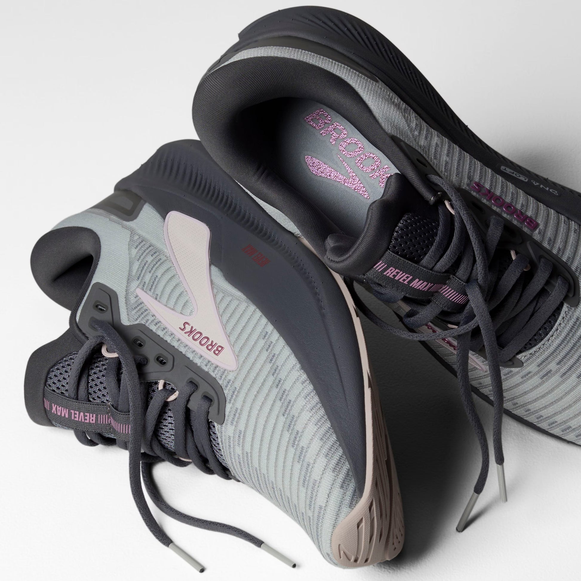 Gray and black Brooks Revel Max shoes with visible branding on a white background