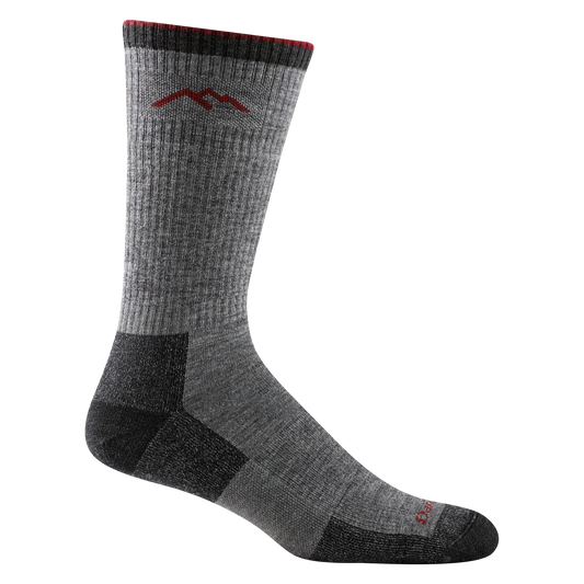 A pair of Darn Tough men's midweight hiking socks in charcoal color with red detailing at the top.