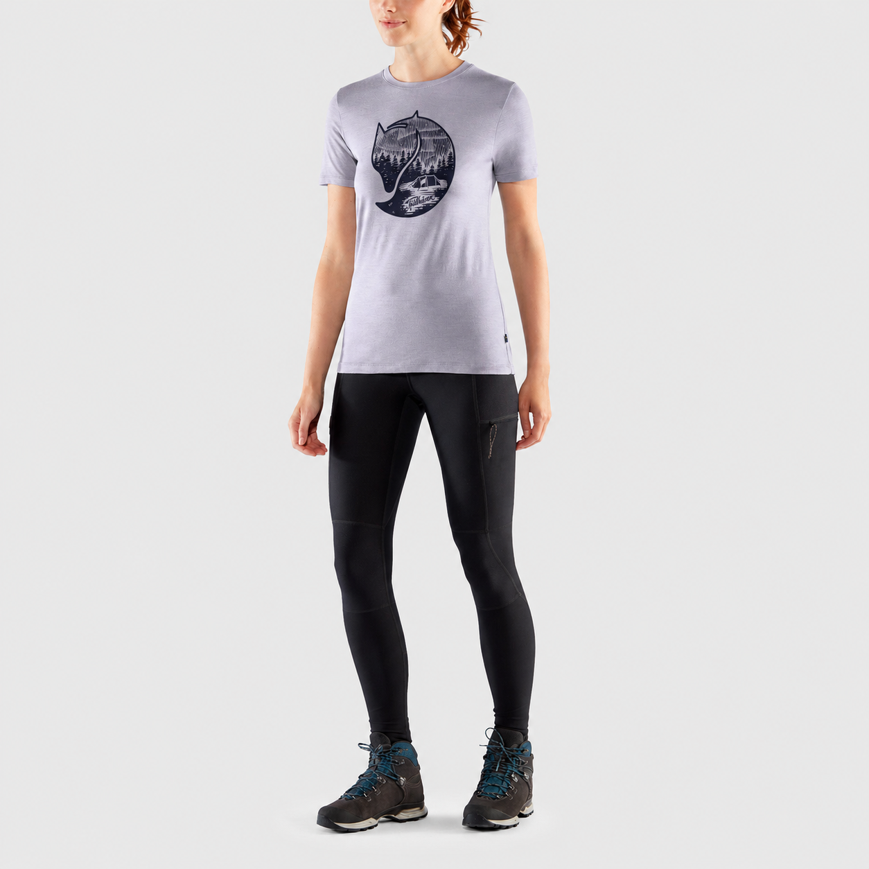 Model wearing the Fjallraven Abisko Wool Fox Short Sleeve T-Shirt in Lavender