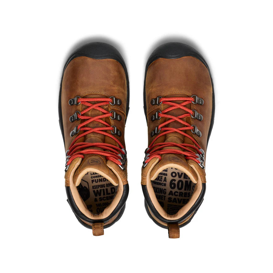 BBirdseye view of bown leather Keen womens hiking boots with a black sole and orange laces.