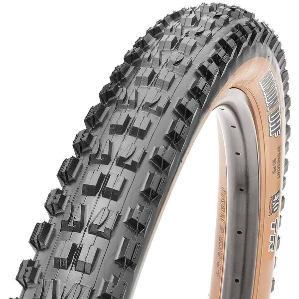 Maxxis DHF mountain bike tire with a tan wall and black tread.