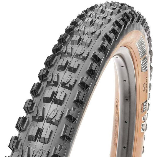 Maxxis DHF mountain bike tire with a tan wall and black tread.