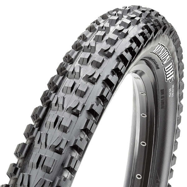 A close-up image of the Maxxis Minion DHF EXO Dual Compound mountain bike tire, showing the tread pattern and sidewall.