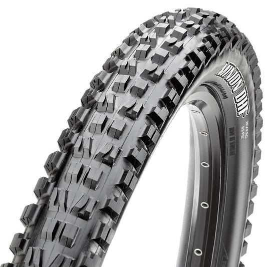 A close-up image of the Maxxis Minion DHF EXO Dual Compound mountain bike tire, showing the tread pattern and sidewall.