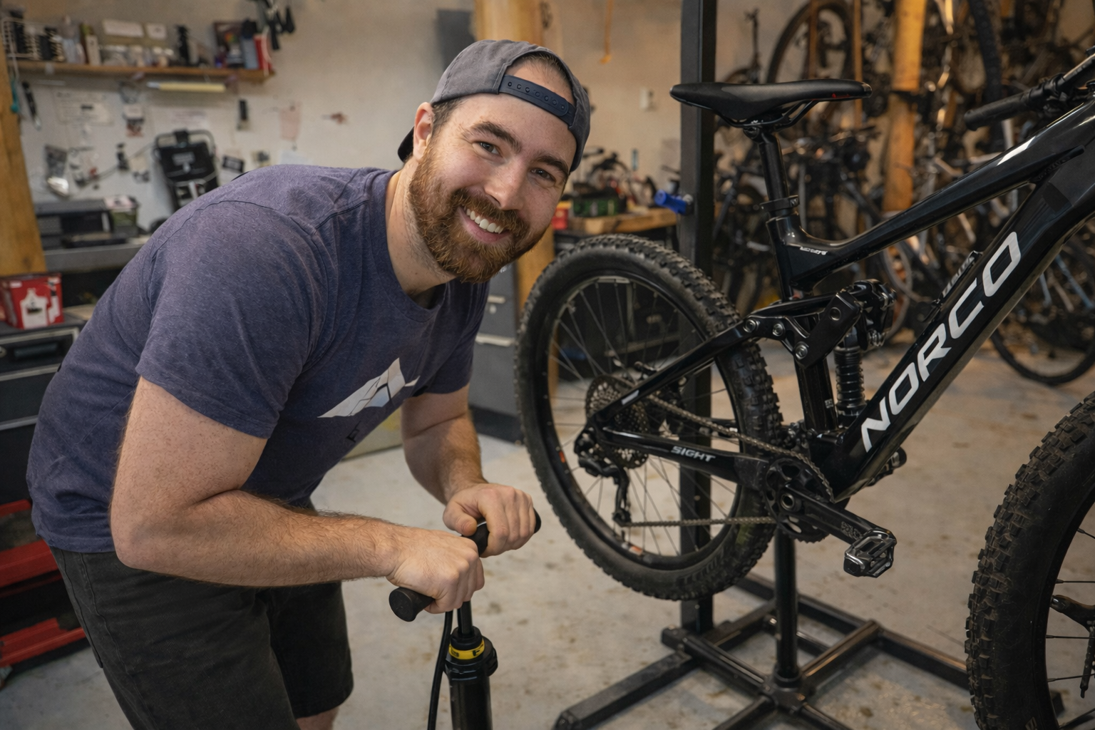 Maveric Northcott, owner of Wells Gray Outfitters in Clearwater BC performing a regular bike tune up