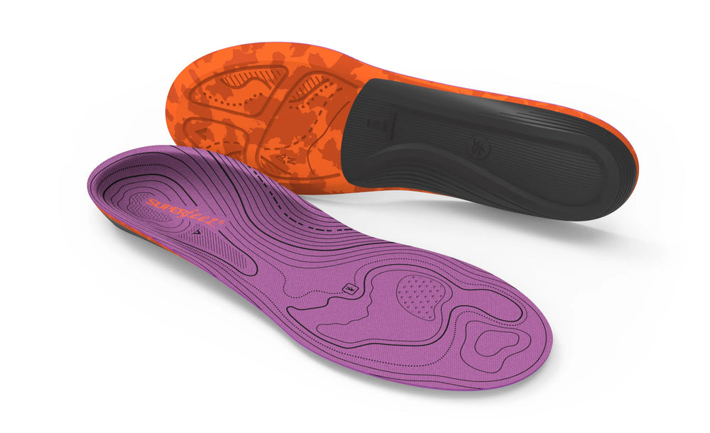 Two hiking insoles shown on a white background, one displaying the purple contoured upper side and the other showing the orange and black textured sole.
