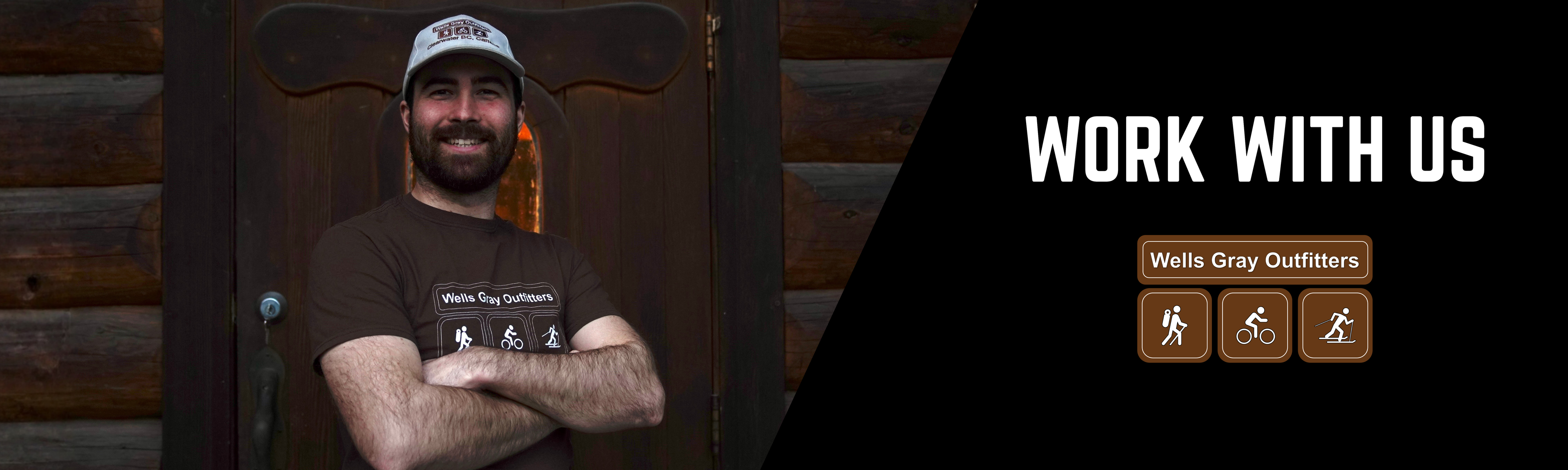 Man standing in front of a wooden wall with 'Wells Gray Outfitters' branding, text 'Work with us'.