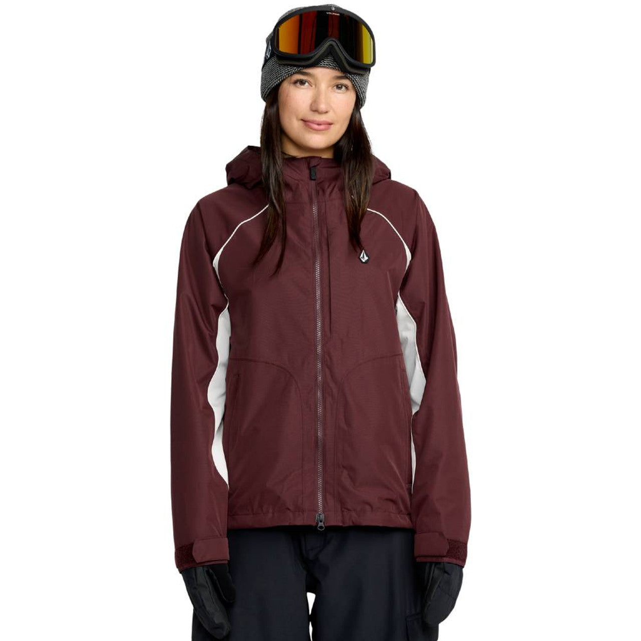 Young woman wearing the Volcom Stone Smokeshow 20k snowboard jacket in oxblood colour.